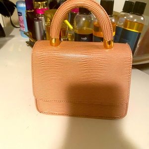Small pink handbag can hold phone keys etc